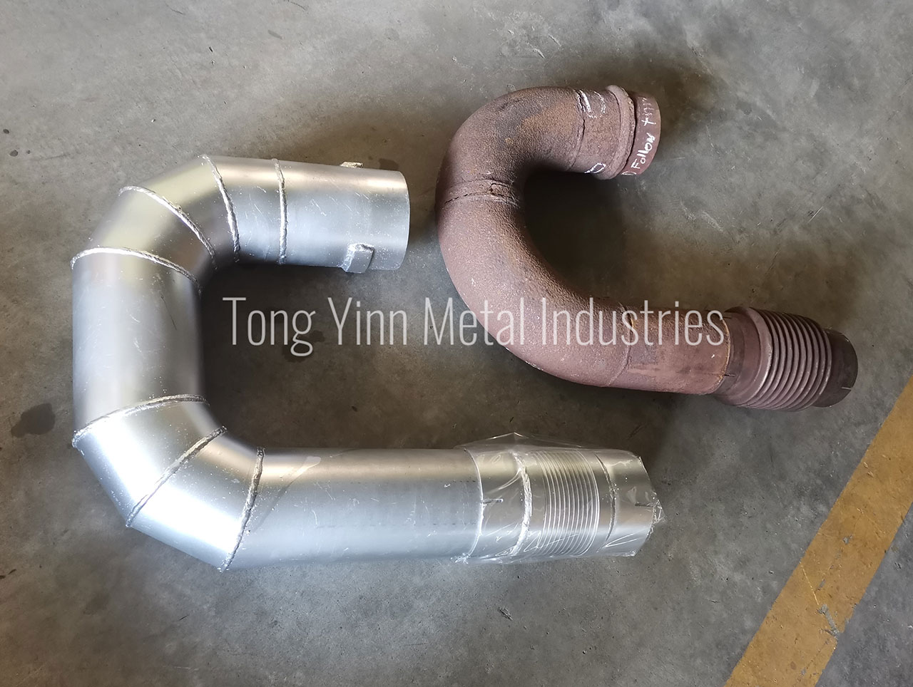 C shape engine pipe with flexible hose